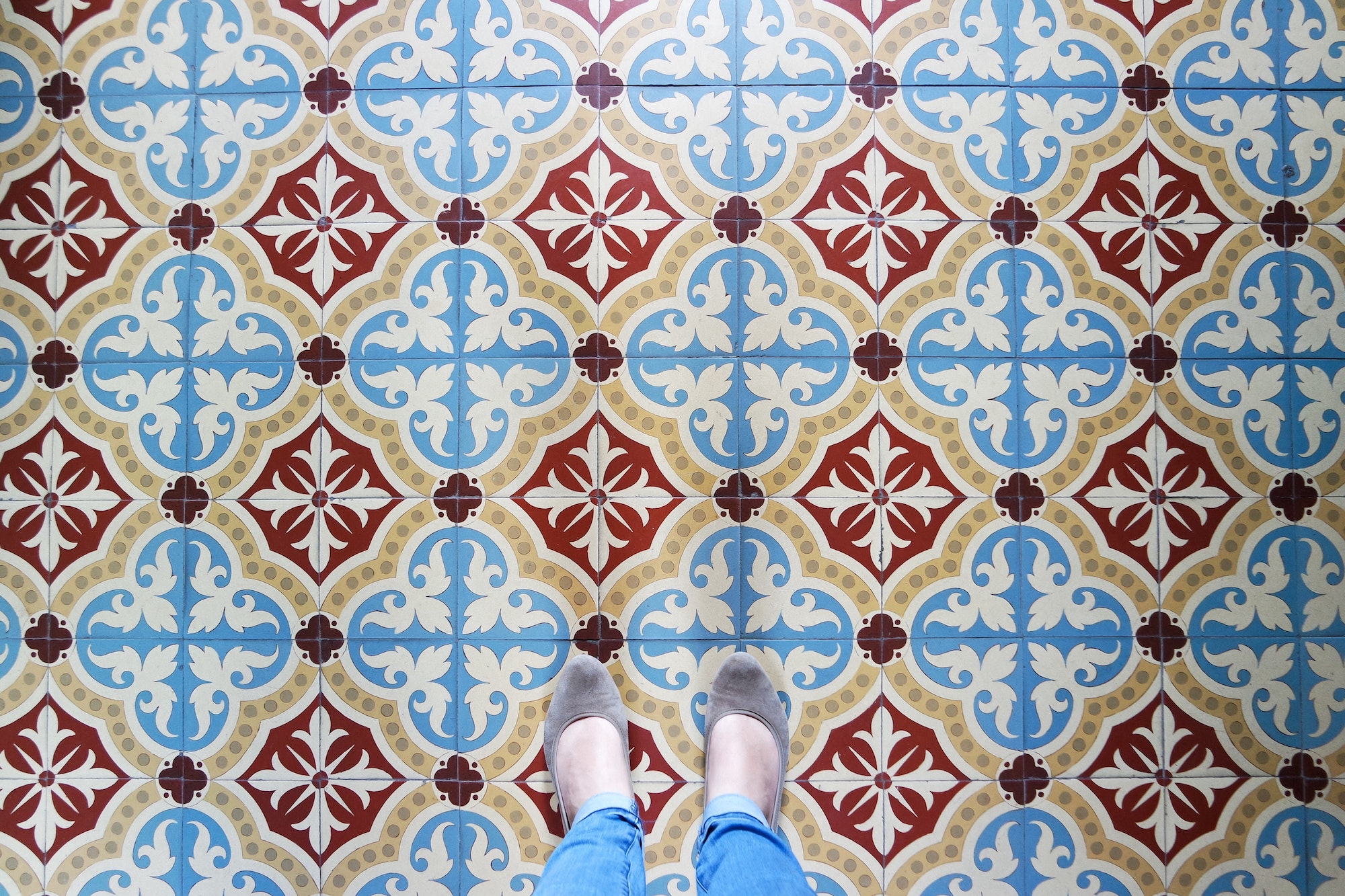 Standing on the decorative tiled floor, view from above.